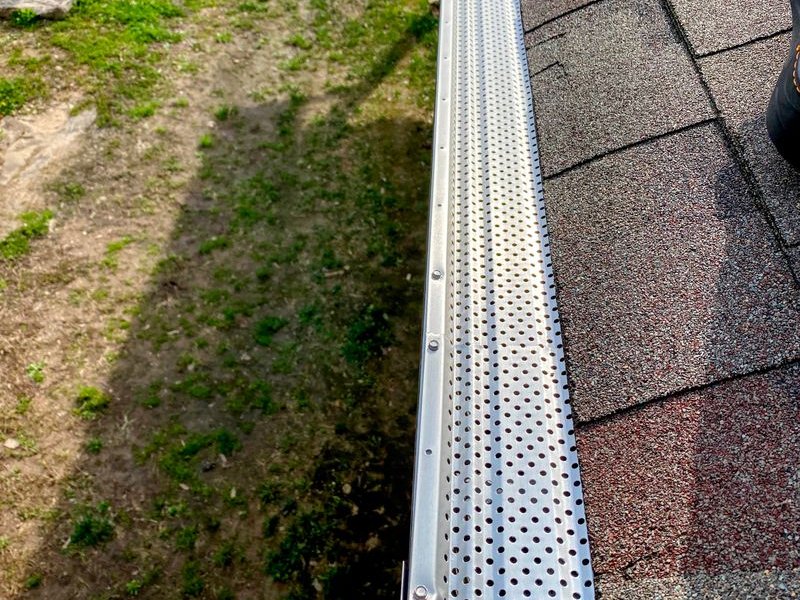 Professional gutter guard installed on residential home in Columbia IL